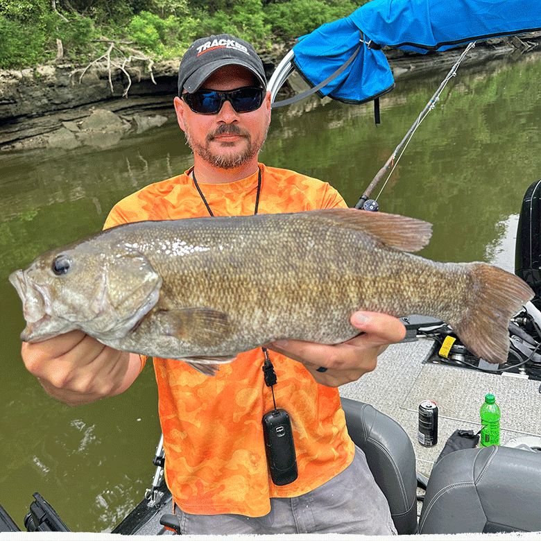 Josh From Buck Maxx Showcasing A Successful Fishing Trip